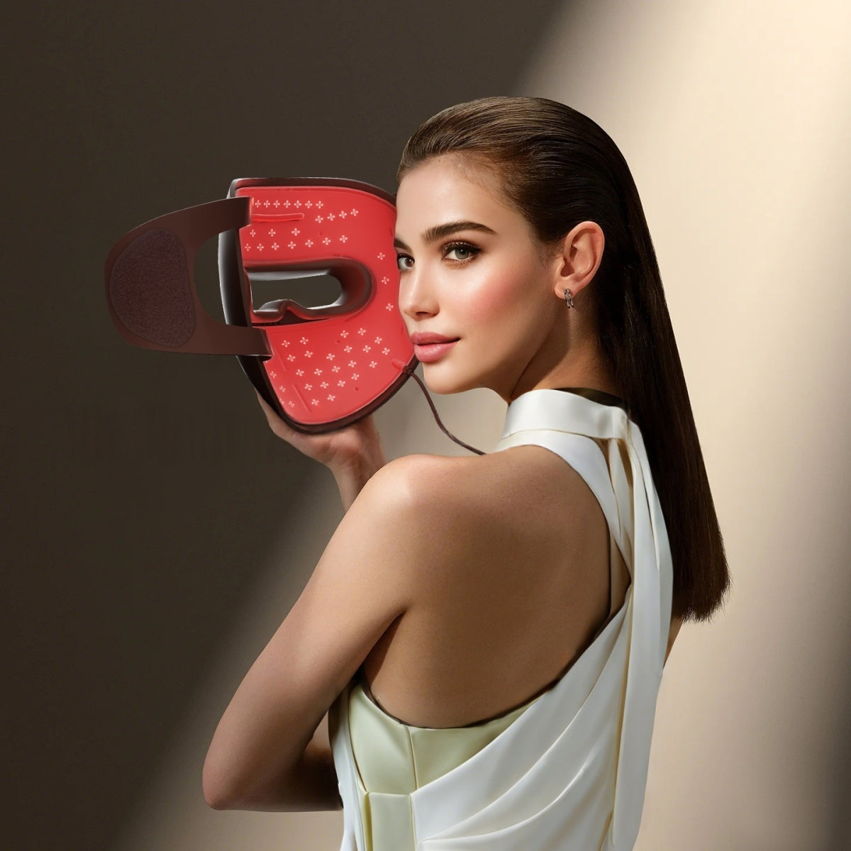 DKYN Radiance Mask worn on face, glowing red light therapy